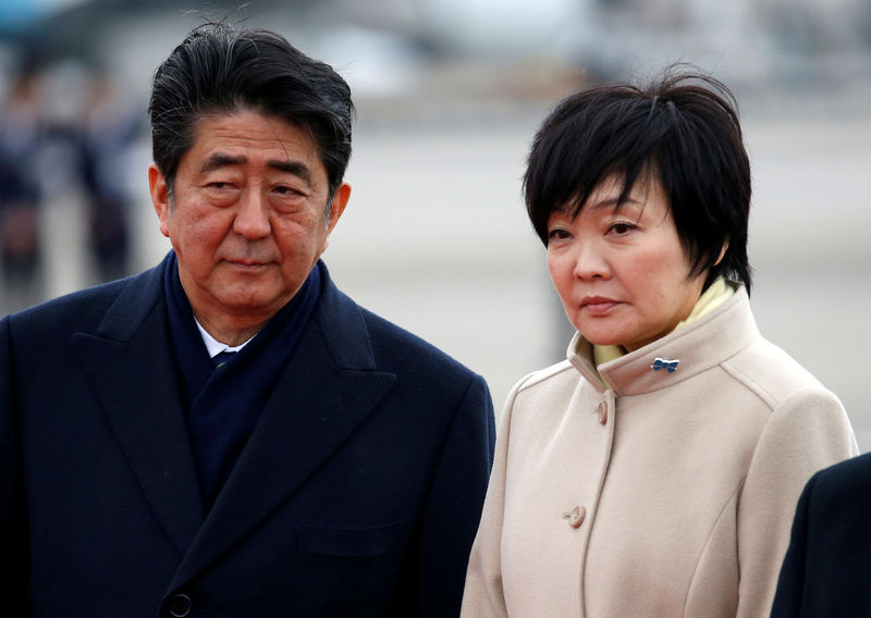 Japan PM Abe denies involvement by him, wife in discount land sale