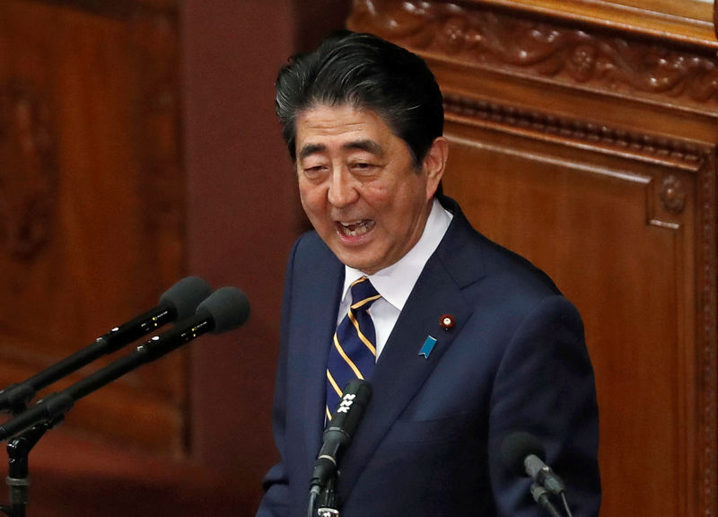 Japan PM Abe says BOJ