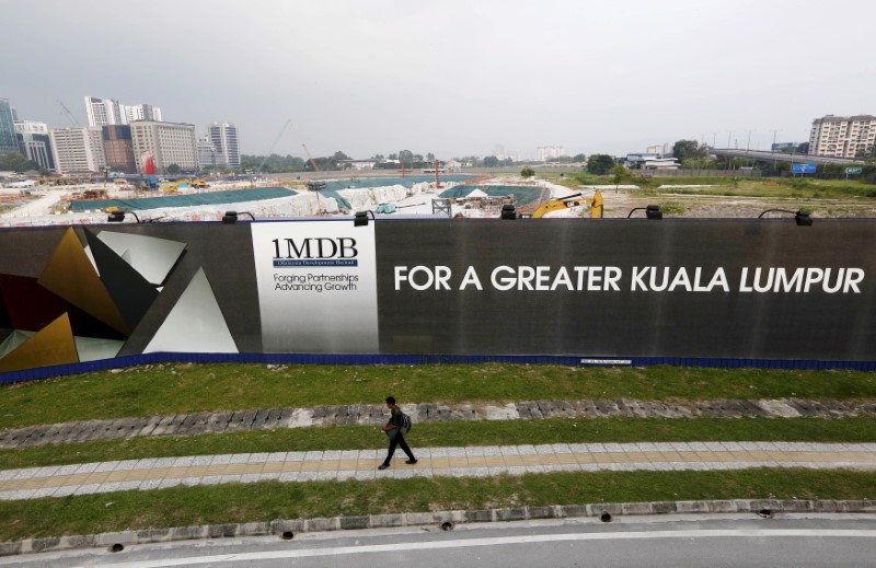 Malaysia arrests Najib ex-aide in 1MDB probe: media