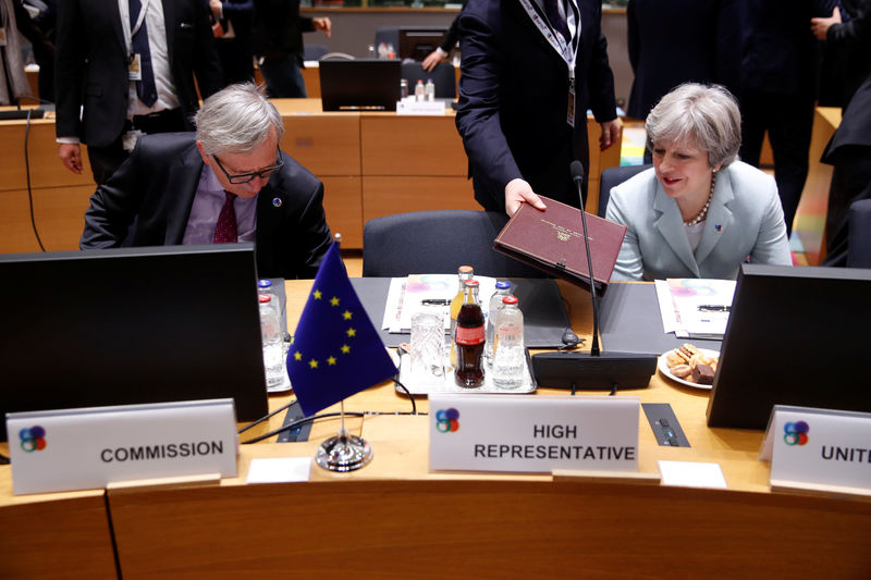 May calls on EU to move with Britain to open Brexit trade talks