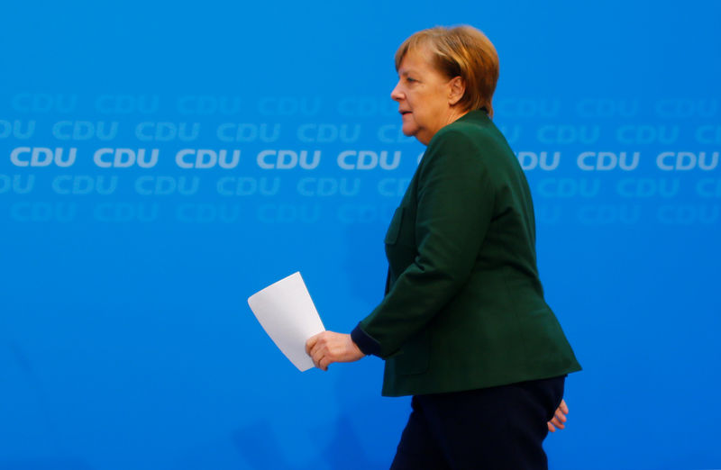 Merkel says must stick to growth-friendly investment and budget consolidation