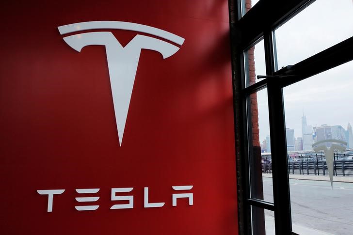 Midday movers: Tesla, Apple, Hostess Brands and more