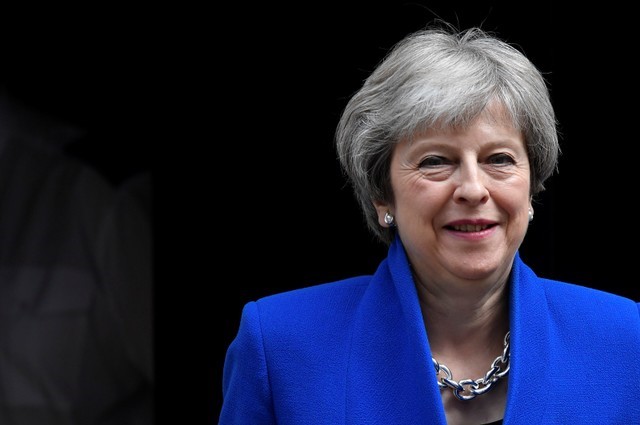 My government will always back business, says British PM May