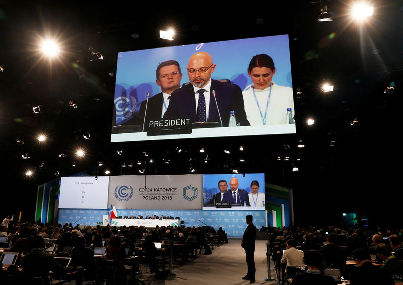 Nations agree global climate pact rules after overcoming impasse