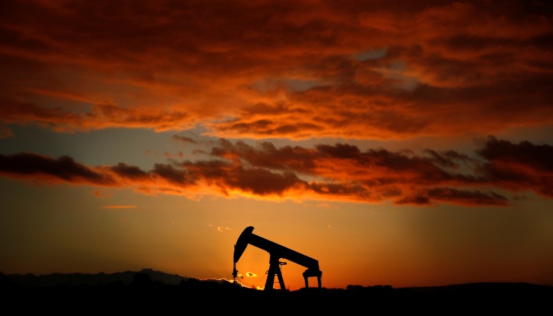 Oil dips as emerging market woes dim demand outlook; Iran sanctions offer support