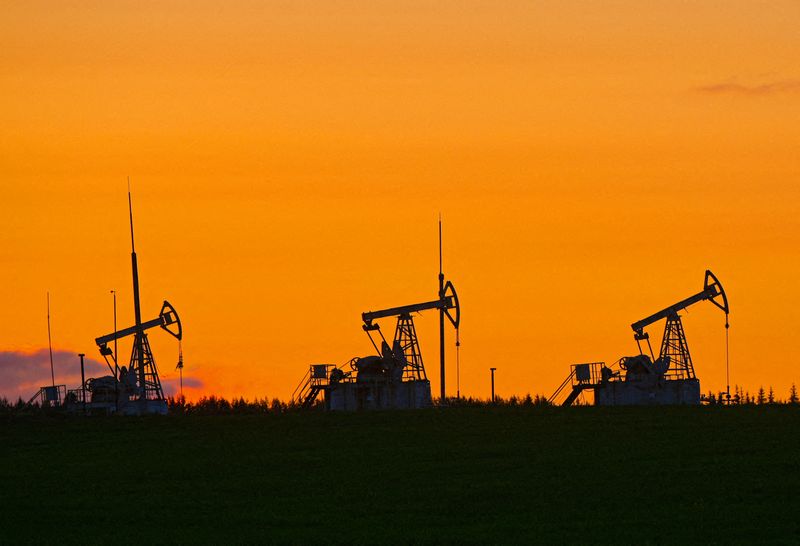 Oil falls in early trade on strong US dollar, profit taking