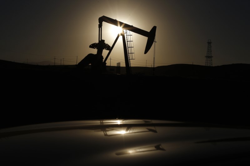 Oil stable as stronger dollar weighs while China