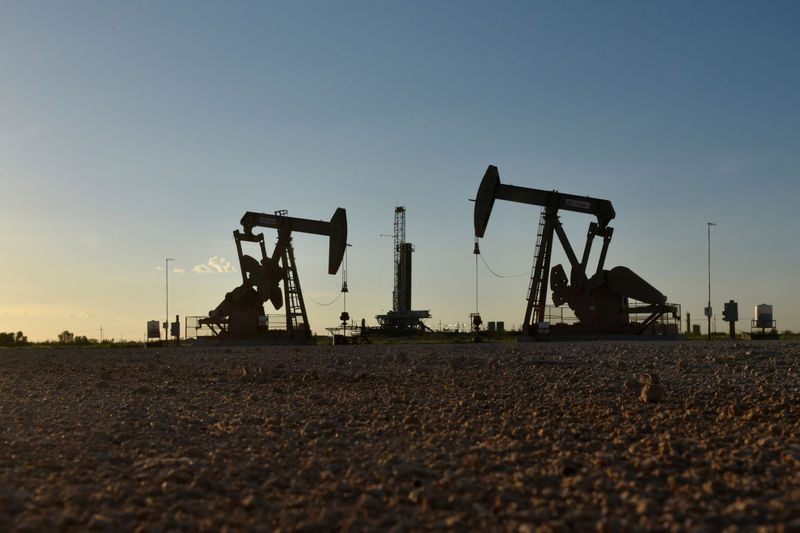 Oil prices ease as trade row clouds demand outlook