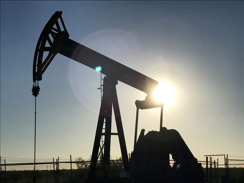 Oil prices fall on strong dollar, Brent near one-month low