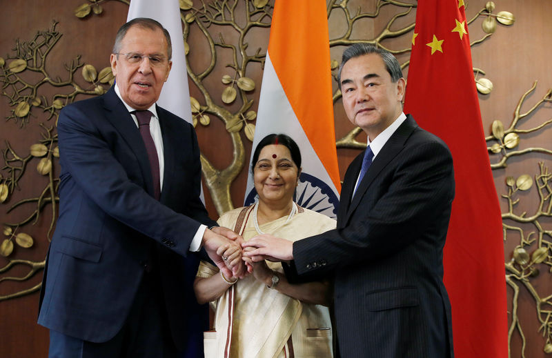 Russia urges India to line up behind China