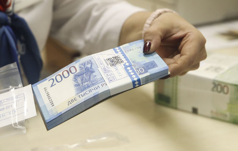 Russian economy minister sees ruble firming to 63-64 to dollar in December