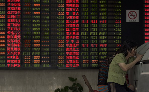 Shanghai stocks down by lunch