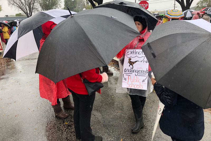 Striking Los Angeles teachers rally near City Hall as talks resume