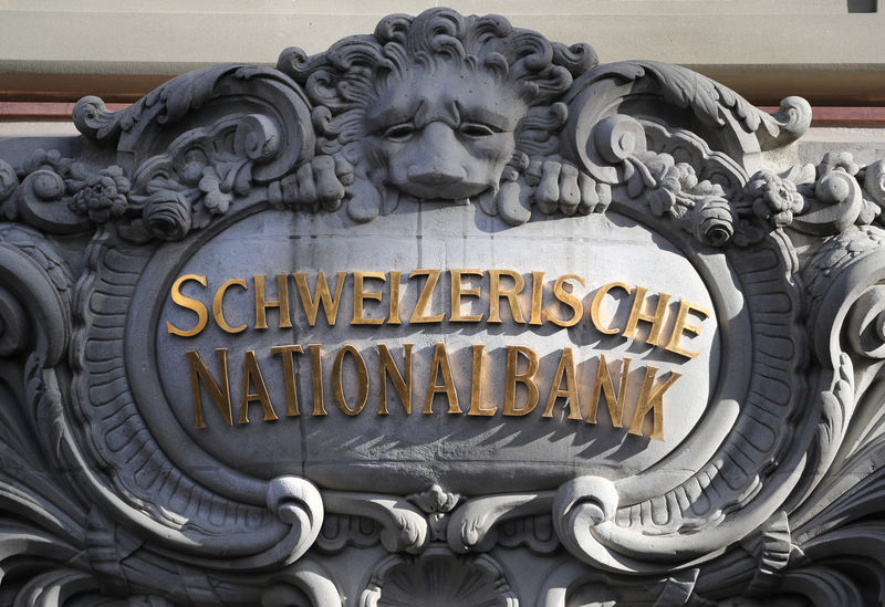 Swiss National Bank keep expansive policy, cuts inflation view