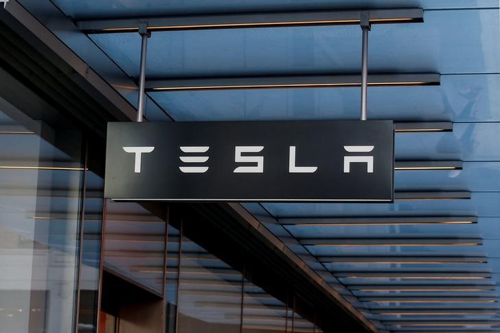 Tesla dips after Q1 deliveries report; analyst reactions mixed