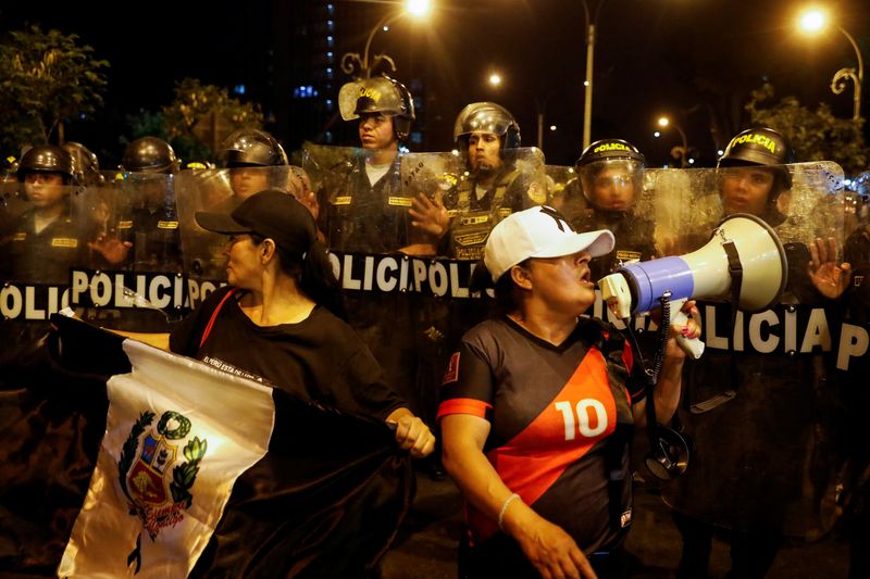 Thousands march in Peru capital demanding president step down