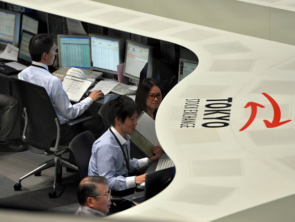 Tokyo stocks tumble on VW scandal, stronger yen