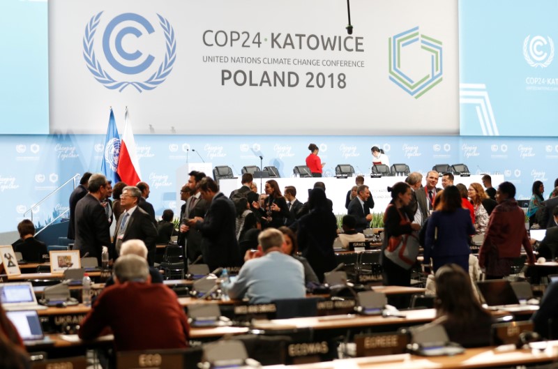 U.N. climate talks run into overtime, but deal 