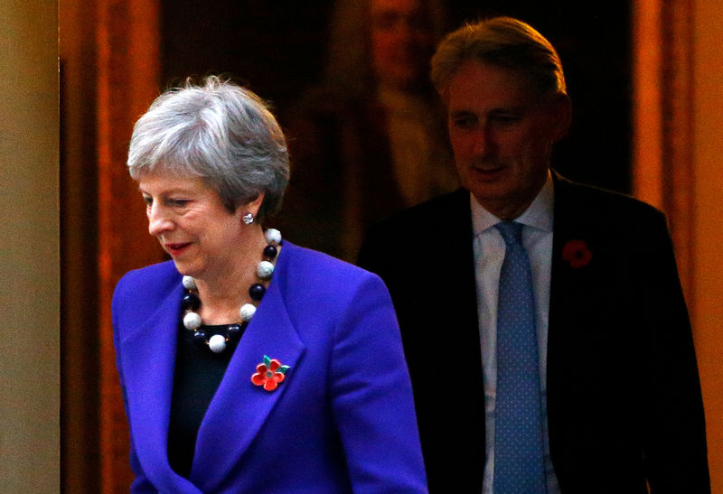 UK PM no closer to deal to leave EU as poll says Britons want to stay