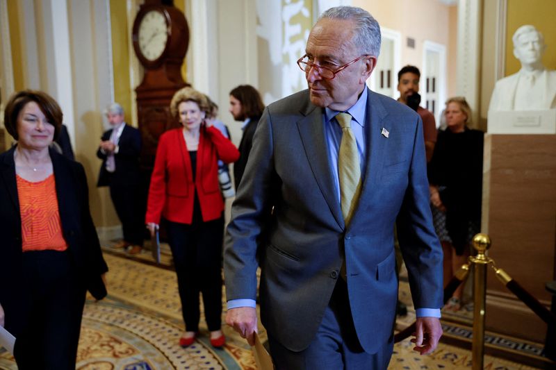 US Congress averts historic default, approves debt-limit suspension