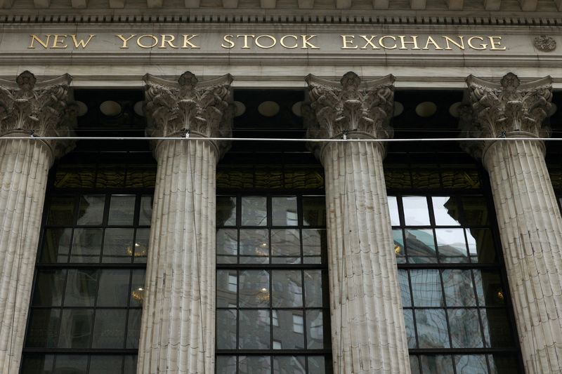 Wall Street ends mixed after job openings hint at cooling economy