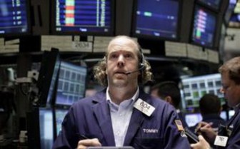 US markets reopen after storm; Dow loses 0.1%