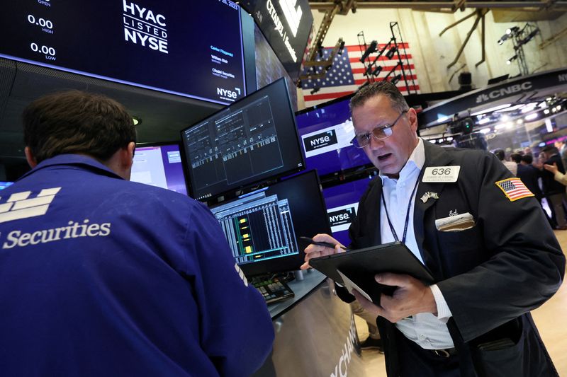 Wall St pounded as investors grapple with higher rates