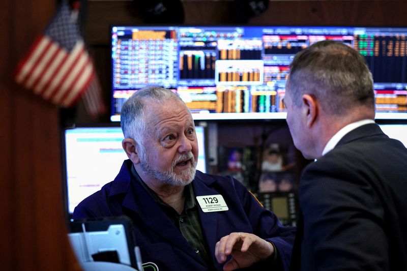 Wall St ends down after PPI data and as chipmakers fall