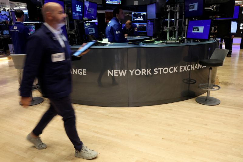 Wall St regains ground on megacap boost; Fed speakers in focus