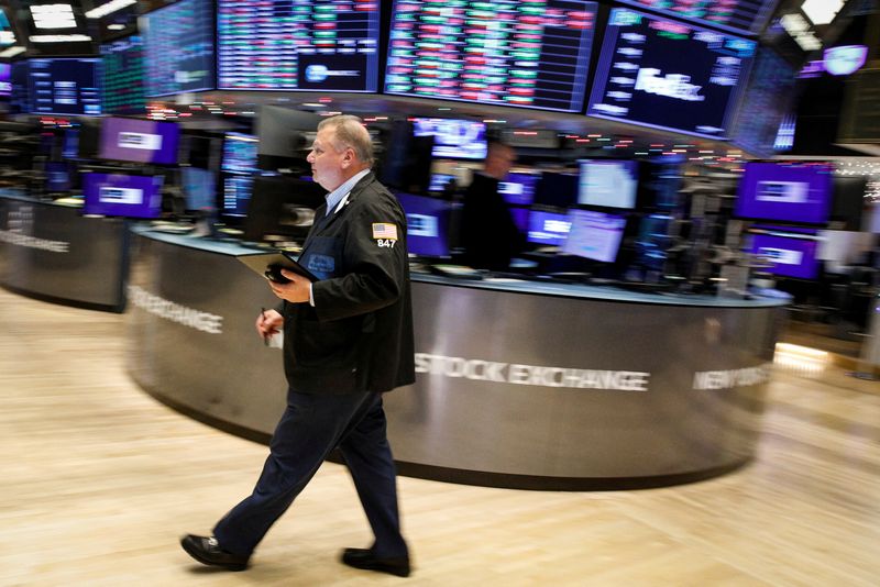 Wall Street ends down; investors eye Omicron and Fed meeting