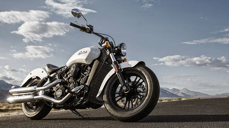 We ditch work to test an Indian Scout Sixty...and a Ferrari F12 Berlinetta...and the world