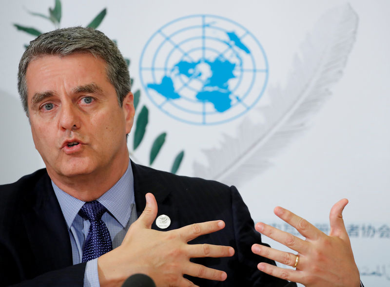 WTO chief sees trade war ending in political talks